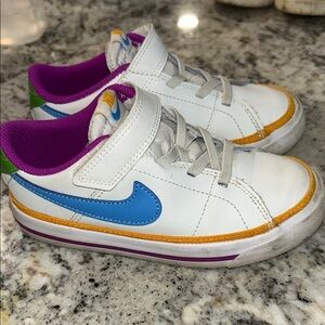 Nike Kids White Sneakers with Blue Swoosh and Purple Lining